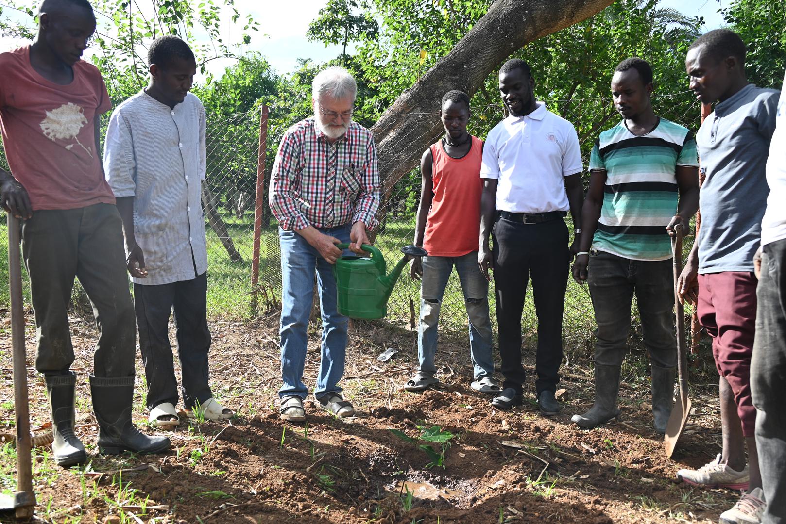CEO-Administrator-together-with-Hospital-staff-of-SKHM-watering-the-newly-transplated-seedling-trees